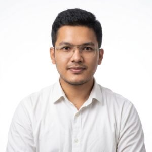 Create professional headshot on a white background from this attached photo 11 (13)