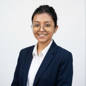 Create professional headshot on a white background from this attached photo 11 (3)