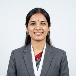 Create professional headshot on a white background from this attached photo 11 (6)
