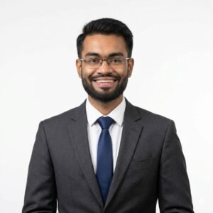 Create professional headshot on a white background from this attached photo 11 (8)