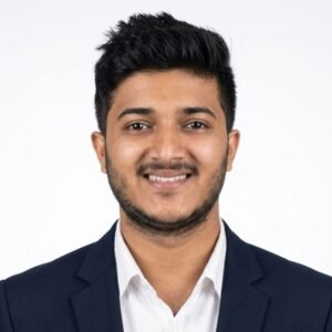 Create professional headshot on a white background from this attached photo 11 (9)